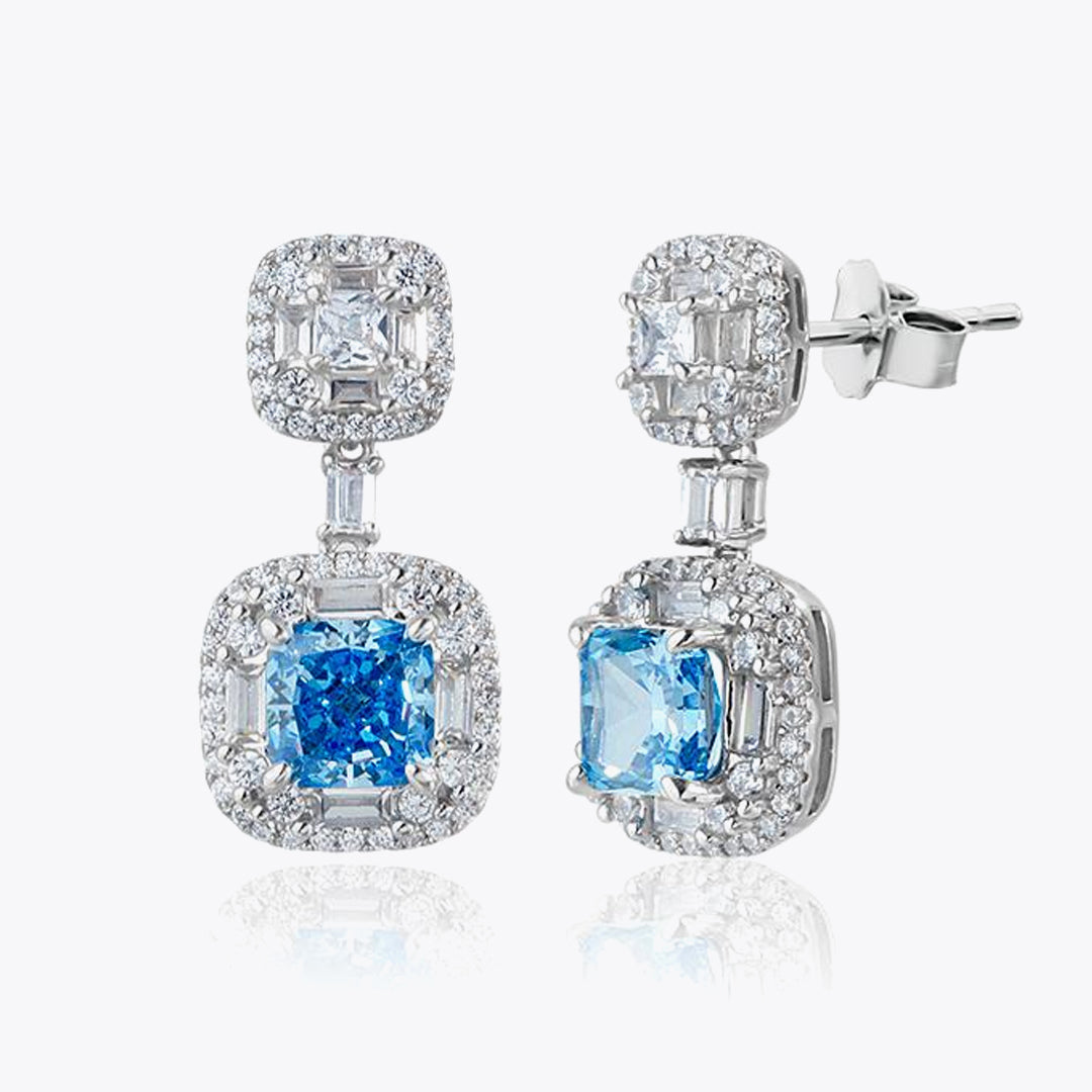 Silberne Luxusohrringe mit blauen und weißen Zirkonias DMNK008