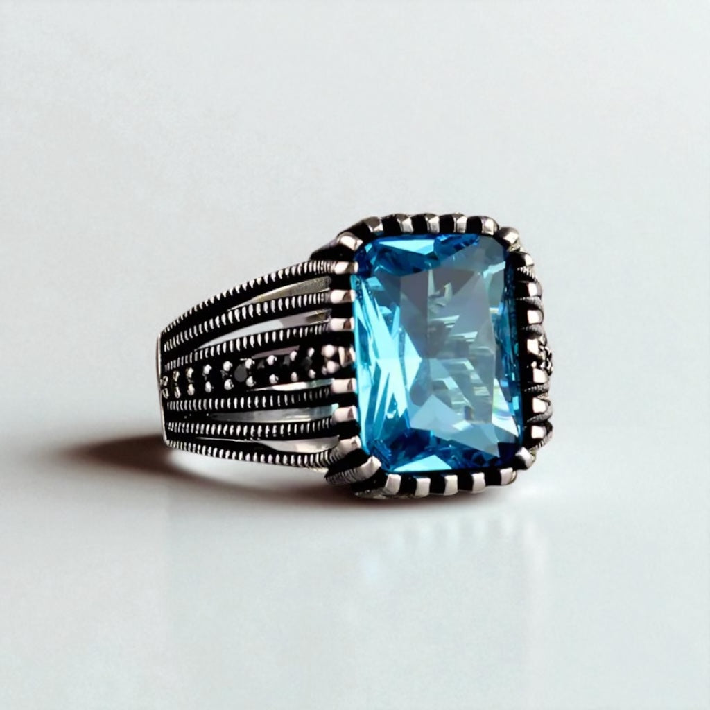 Zilveren heren ring met blauwe steen